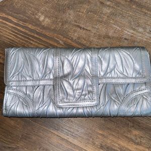 Silver clutch handbag snap closure and hidden chain strap Jessica McClintock